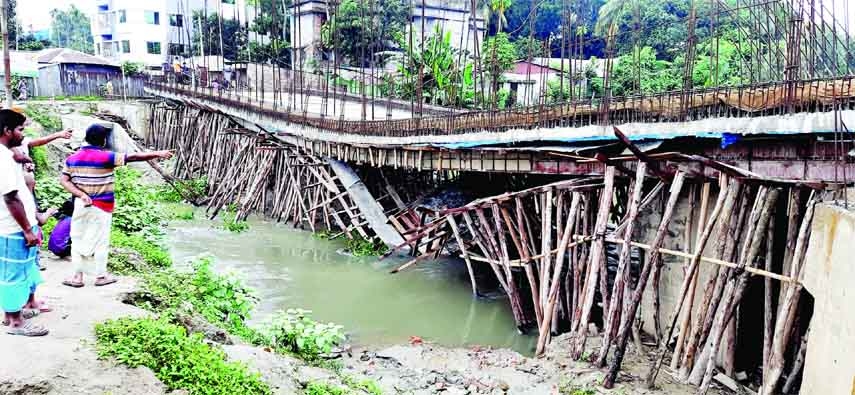 TANGAIL : The under construction bridge on Louhjong River in Bardoma area of Tangail City-Beradoma-Omarpur Road has collapsed recently.