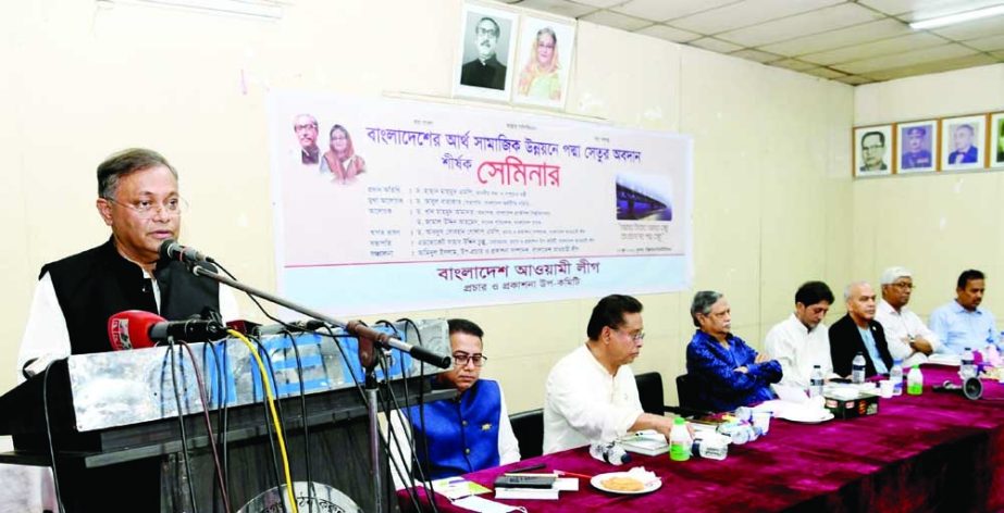 Information and Broadcasting Minister Dr. Hasan Mahmud speaks at a seminar on 'Contribution of Padma Bridge in Socio-economic Development of Bangladesh' in the auditorium of Engineers' Institution in the city on Wednesday. NN photo