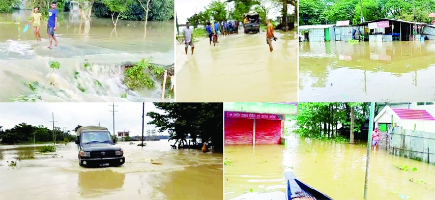 SYLHET: Villages, roads, and bazars of different areas in Fenchuganj Upazila are submerged due to flood water caused by heavy rainfall and onrush of hilly water. The picture was taken on Wednesday.