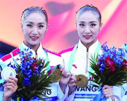 China's Wang Liuyi and Wang Qianyi on the podium after winning the women's duet free final of the artistic swimming at the FINA World Championships, Alfred Hajos Swimming Complex, Budapest, Hungary on Thursday.