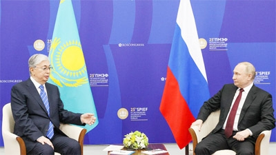 Kazakhstan President and Russian President Putin holding a bilateral meeting to stop discord.
