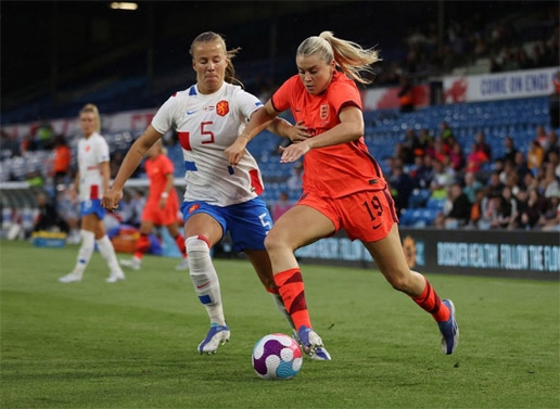 England's Millie Bright (right) in action with Netherlands' Marisa Olislagers during the Women's International Friendly at the Elland Road, Leeds, Britain on Friday.