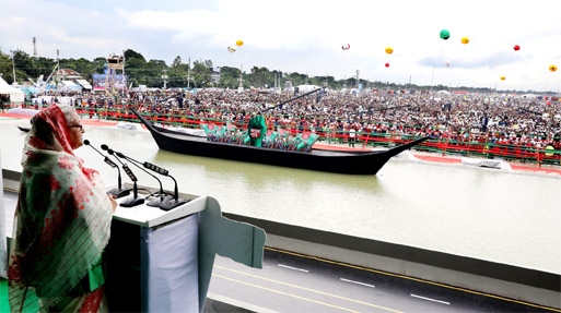 Prime Minister Sheikh Hasina addresses a mammoth public meeting at Kathalbari in Shibchar upazila under Madaripur district on Saturday marking the inauguration of Padma Bridge.