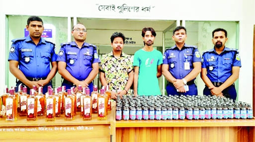 SHERPUR : Two drug peddlers with 190 bottles of Phensidyl and 24 bottles of whiskey at Uttar Bazar area in Nalitabari town of Sherpur district on Sunday.