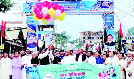 FULBARAI (Mymensingh): Upazila Awami League brings out a rally by releasing balloons at Fulbarai Upazial on the oaccsion of the inauguration of Padam Bridge on Saturday.