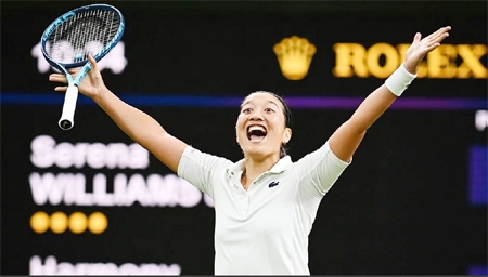 France's Harmony Tan celebrates after beating Serena Williams of the US in a first round women's singles match on day two of the Wimbledon tennis championships in London on Tuesday.