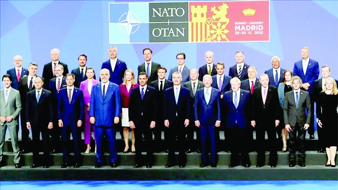 NATO leaders pose for a group photo following the official welcome for the NATO summit in Madrid, Spain, on Wednesday.