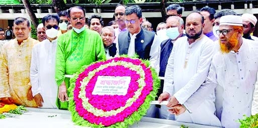 State Minister for Shipping Khalid Mahmud Chowdhury along with others pays floral tributes at the Mazar of Father of the Nation Bangabandhu Sheikh Mujibur Rahman in Tungipara on Friday.