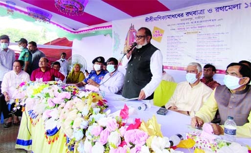 GAZIPUR : Liberation War Affairs Minister AKM Mozammel Haque addresses the inaugural programme marking the Ratha Yatra at Bhawa on Friday. Among others, Anisur Rahman, DC, Gazipur was also present there.