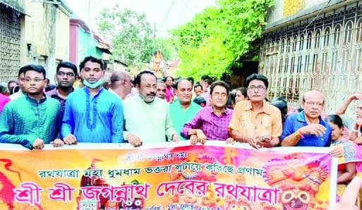 ISHWARDI (Pabna): A rally brings out at Ishwardi Upazila in observance of the Ratha Yatra on Friday.