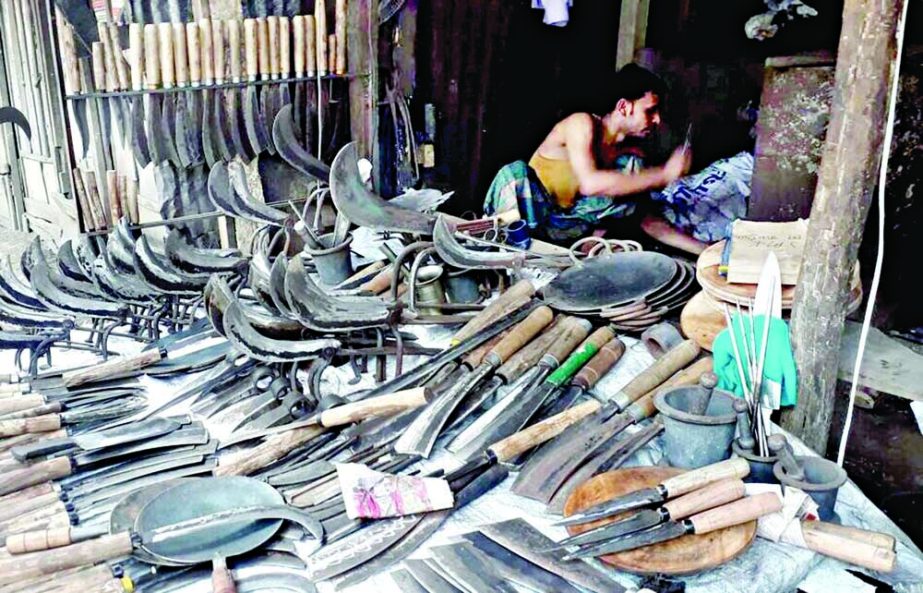 Blacksmith are becoming ready with slaughtering tools on the occasion of the Eid-ul Azaha. NN photo