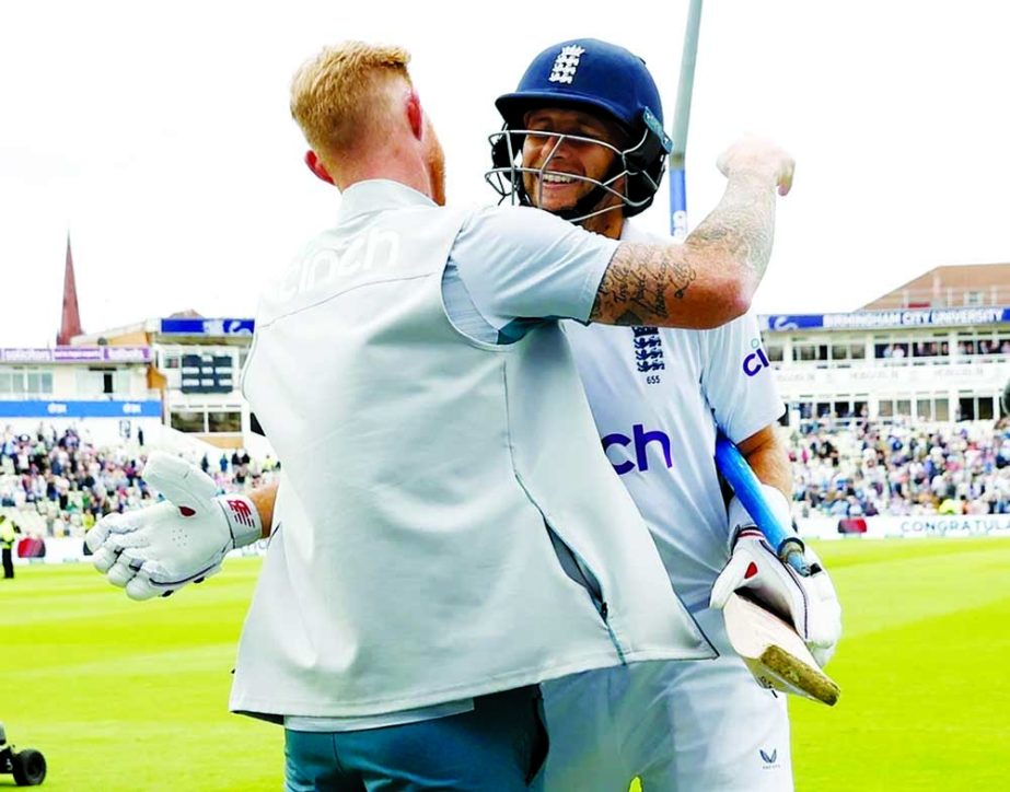 England's Joe Root (right) and Ben Stokes celebrate after winning the match match against India.