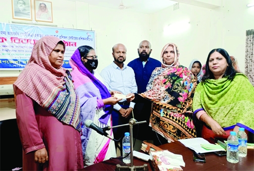 SHARIAKANDI (Bogura):Sahadara Mannan MP distributes cheques among the trainees of special earning related training at Shariakandi Upazial as the Chief Guest organised by Women Affairs Department on Wednesday.