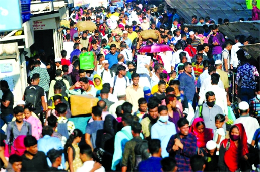 Passengers overcrowd at the Kamalapur Railway Station on Thursday to spend Eid vacation with their near and dear ones.