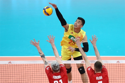 China's Zhang Jingyin spikes against Poland during the Volleyball Nations League in Gdansk, Poland on Thursday.