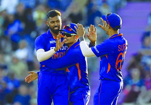 India's Hardik Pandya (left) celebrates with teammates after taking the wicket of England's Dawid Malan during the first T20I between England and India at The Ageas Bowl, Southampton on Thursday.