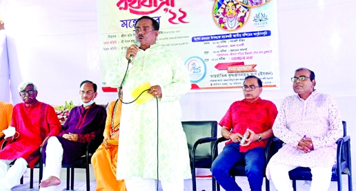 Food Minister Sadhan Chandra Majumder speaks at a discussion organised on the occasion of 'Ulto Rathyatra' on the premises of Shri Shri Dhakeshwari National Temple in the city on Friday.