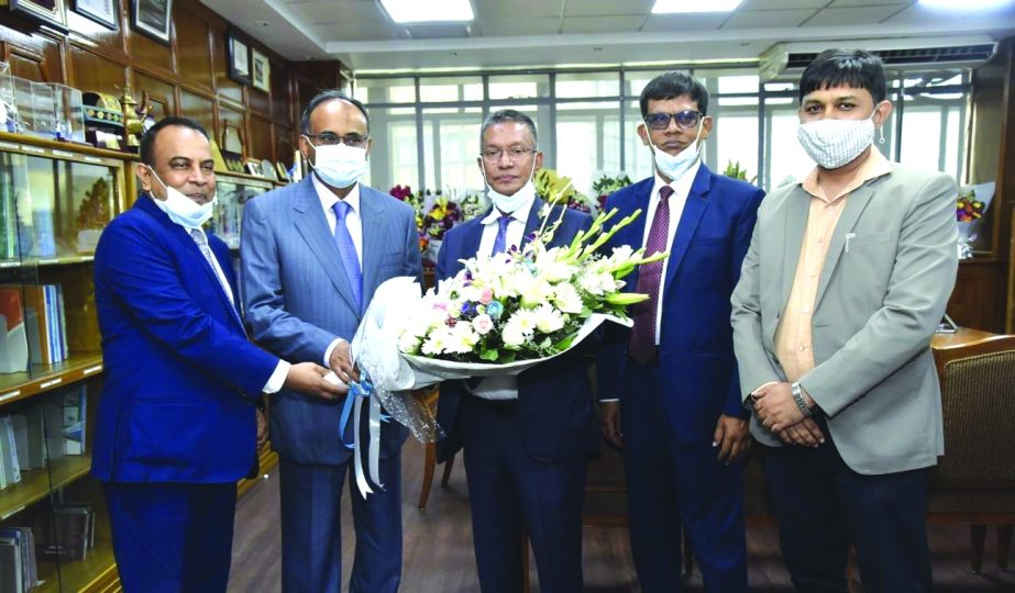Md. Abdus Salam Azad, MD and CEO of Janata Bank Ltd. greeted newly appointed Bangladesh Bank governor Abdur Rouf Talukder with a floral wreath at his office Tuesday. Md. Abdul Jabbar and Sheikh Md. Zaminur Rahman,DMDs of the bank also present.