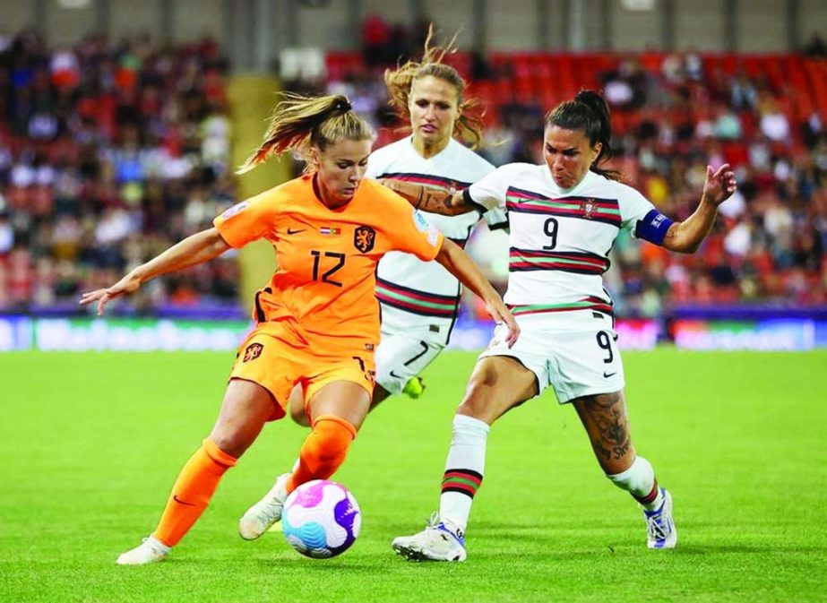 Netherlands' Victoria Pelova (left) in action with Portugal's Ana Borges during the Women's Euro 2022, group C, soccer match between Netherlands and Portugal at Leigh Sports Village in Wigan & Leigh, England on Wednesday. Agency photo