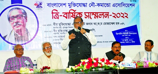 Liberation War Affairs Minister AKM Mozammel Haque speaks at the triennial conference of 'Bangladesh Muktijoddha Nou-Commando Association' at Dhaka Reporters Unity on Friday.