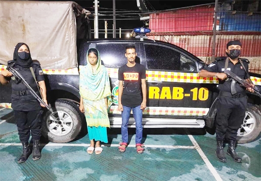 RAB-10 detains two members of child lifting gang from the city's Kamrangirchar on Friday.