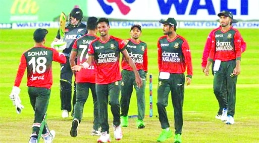 Players of Bangladesh Cricket team in action against New Zealand Cricket team during their Twenty20 International match recently.