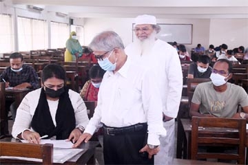 DU Vice-Chancellor Prof. Dr. Akhtaruzzaman visits an examination center of Executive MBA Programme-2022 of Business Studies Faculty of DU on Friday.