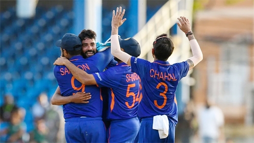 Mohammed Siraj (2nd left) of India celebrates winning the 1st ODI match between West Indies and India at Queens Park Oval, Port of Spain, Trinidad and Tobago on Friday.