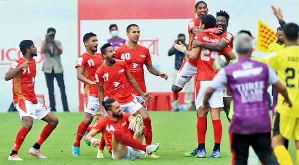 Members of Bashundhara Kings celebrate after defeating Dhaka Abahani Limited in their match of the TVS Bangladesh Premier League Football at Bashundhara Sports Complex in Dhaka on Monday.