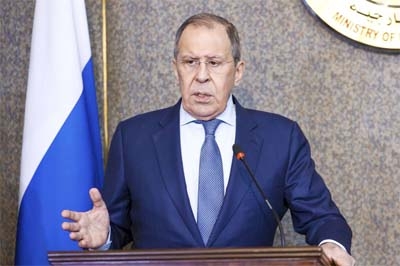 In this handout photo released by Russian Foreign Ministry Press Service, Russian Foreign Minister Sergey Lavrov gestures during a joint news conference with Egyptian Minister of Foreign Affairs Sameh Shoukry, following their talks in Cairo, Egypt.