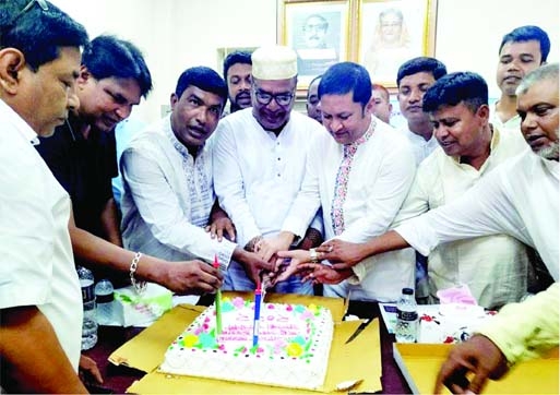 MIRZAPUR (Tangail): Khan Ahmed Shuvo MP and Alhaj Mir Sharif Mahmud, President, Awami League, Mirzapur Upazila with party activists cut a cake on the occasion of the founding anniversary of Swechchhasebak League on Wednesday.