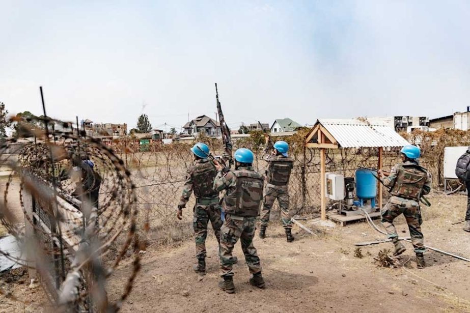 UN soldiers from the peacekeeping mission in the Democratic Republic of Congo (MONUSCO) take position at a looted warehouse at the UN facilities in Goma. Agency photo