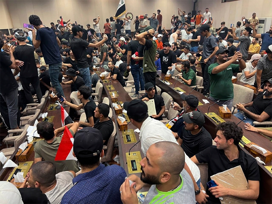 Iraqi protesters breach Baghdad's parliament in Baghdad, Iraq, Wednesday, July. 27, 2022.