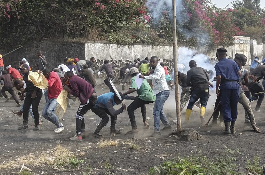 Demonstrators clash with police during a protest against the United Nations peacekeeping force (MONUSCO) deployed in the Democratic Republic of the Congo in Sake, some 15 miles (24 kms) west of Goma, Wednesday July 27, 2022.