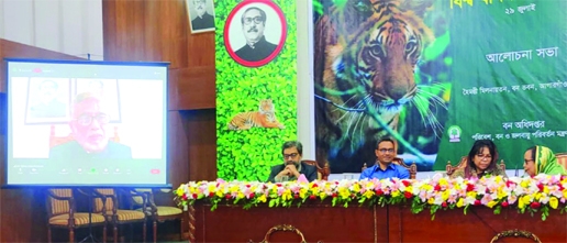 Environment, Forest and Climate Change Minister Shahab Uddin speaks virtually at a ceremony organized on the occasion of 'World Tigers Day-2022' at the Directorate of Forest in the city on Friday.