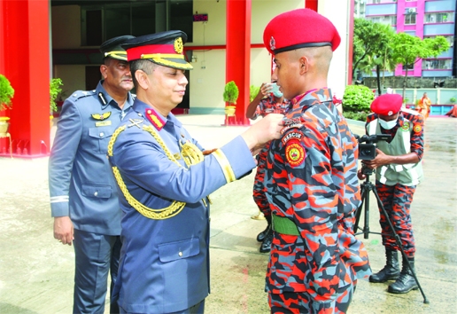 DG of FSCD Directorate Gen. Main Uddin, among others, at the fundamental parade of the 60th batch fire fighters on the directorate premises in the city on Thursday.