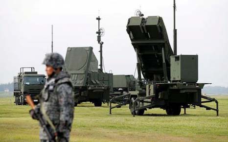 A Japan Self-Defense Forces (JSDF) soldier takes part in a drill to mobilise their Patriot Advanced Capability-3 (PAC-3) missile unit in response to a recent missile launch by North Korea.