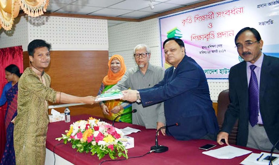 Bangladesh House Building Finance Corporation (BHBFC) has organized a `Scholarship Giving Ceremony' at its Training Center in the capital recently. Chairman of the BHBFC Board of Directors Sheikh Aminuddin Ahmed was the chief guest on the occasion. Mana