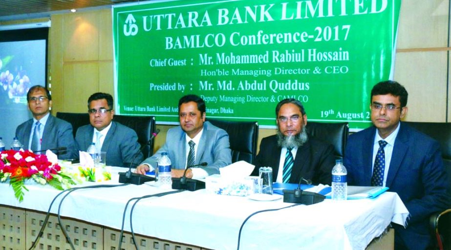 Mohammed Rabiul Hossain, Managing Director of Uttara Bank Limited, presiding over the 'BAMLCO Conference-2017' at the bank's auditorium in the city recently. Md. Abdul Quddus, Maksudul Hasan, Sultan Ahmed, DMDs and Mohammed Mosharraf Hossain, AMD of th