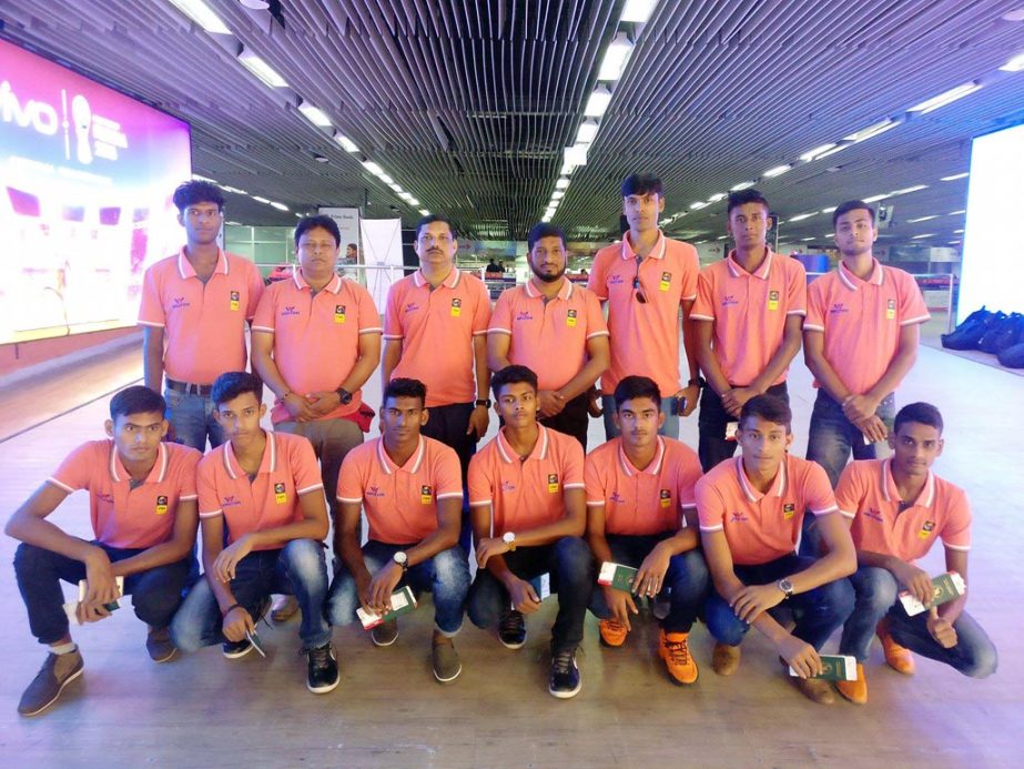 Members of Bangladesh Under-16 Basketball team pose for photograph at the Hazrat Shahjalal International Airport on Sunday before taking part in the South Asian Basketball Association Under-16 Championship scheduled to be held in Nepal from today to Septe