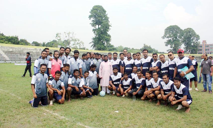 The participants of the inaugural match of the Walton Bindubashini Boys' Football Tournament with the Headmaster of Bindubashini Government Boys High School and the officials of Walton Group pose for a photo session at Tangail District Stadium on Sunday.