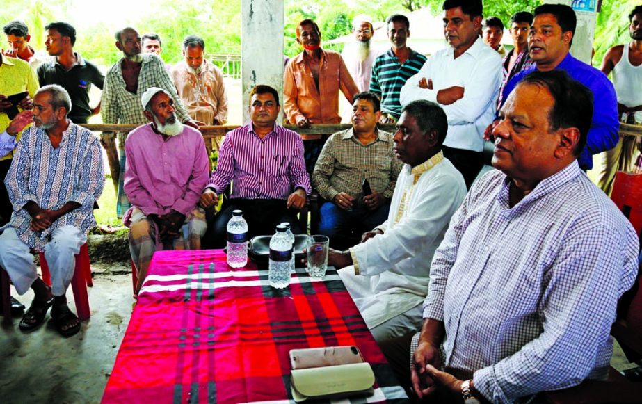 Sheikh Md Wahiduzzaman, Chairman of Janata Bank Limited, taking part at a view exchange programme with the farmers of Chitra village of Rampal, Khulna on Tuesday. Md Morshedul Kabir, GM of Khulna division moderated the function.