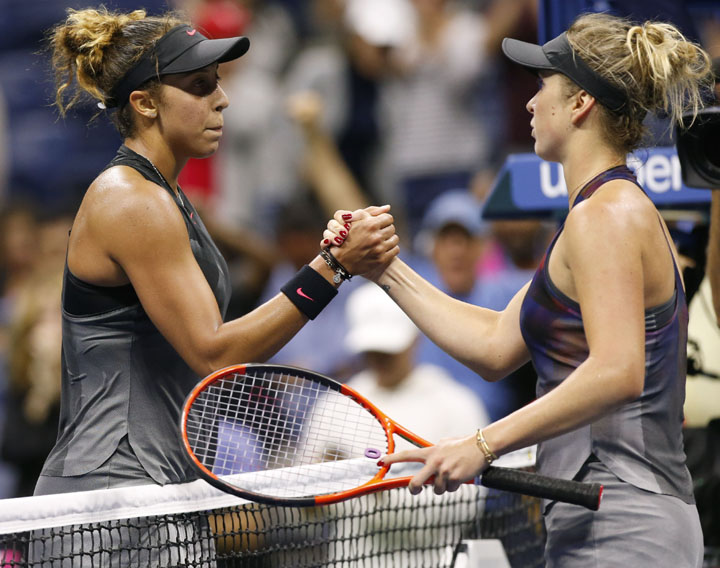 Madison Keys of the United States (left) shakes hands with Elina Svitolina of Ukraine after upsetting her at the US Open tennis tournament in New York on Monday.