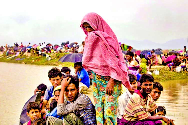 Displaced Rohingya refugees from Rakhine state in Myanmar rest near Ukhia, near the border between Bangladesh and Myanmar, as they flee violence. Internet photo