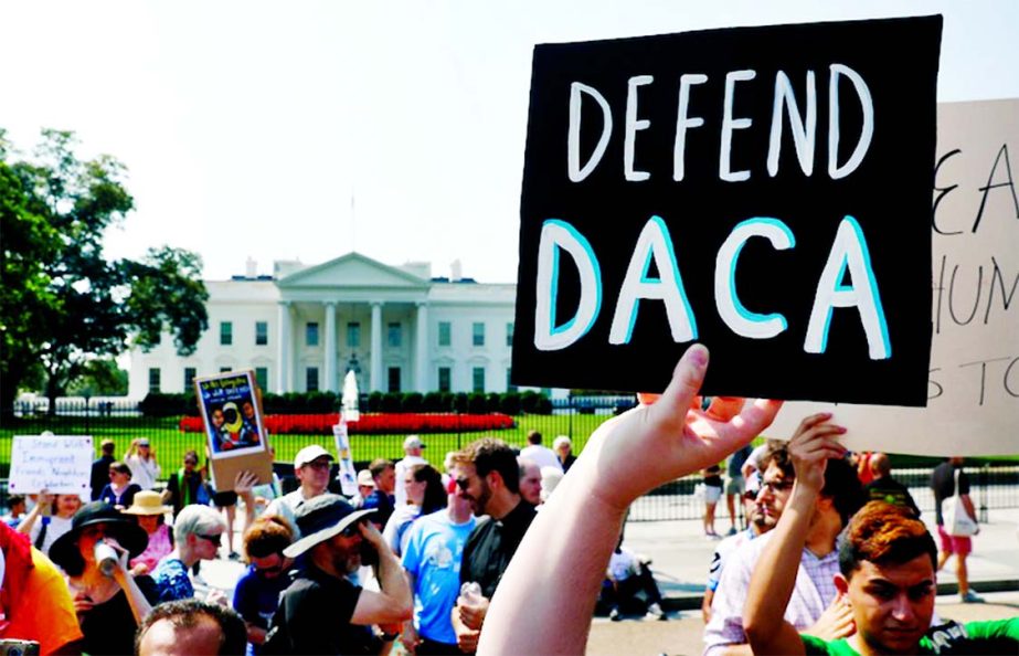 Demonstrators protest in front of the White House after the Trump administration scrapped the Deferred Action for Childhood Arrivals (DACA) in Washington, on Wednesday.