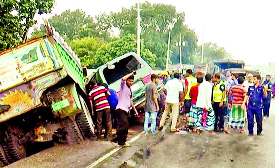 At least eight people were killed and ten others injured in a truck-microbus head-on collision in Karatia area of Dhaka-Tangail Highway on Thursday.
