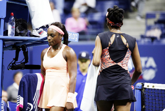 Sloane Stephens of the United States (left) and Venus Williams of the United States pass each other as they walk to their benches between games during the semifinals of the US Open tennis tournament in New York on Thursday.