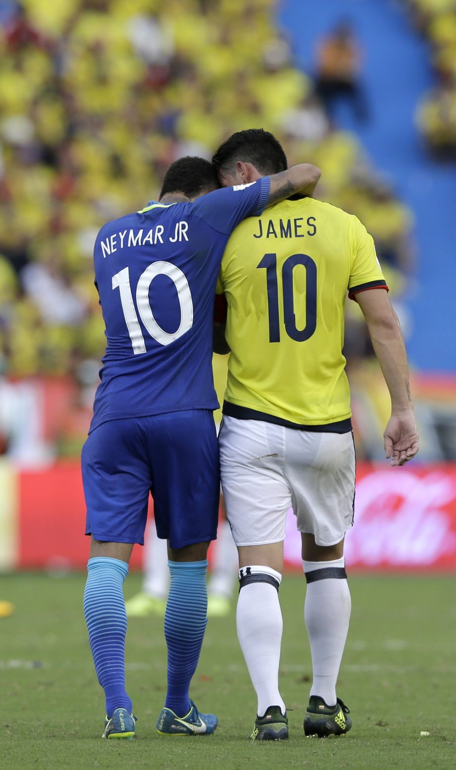 Brazil's Neymar (left) and Colombia's James Rodriguez embrace at the end of 2018 Russia World Cup qualifying soccer match at the Roberto Melendez stadium in Barranquilla, Colombia on Tuesday (Sept 5). The match ended in a 1-1 tie.