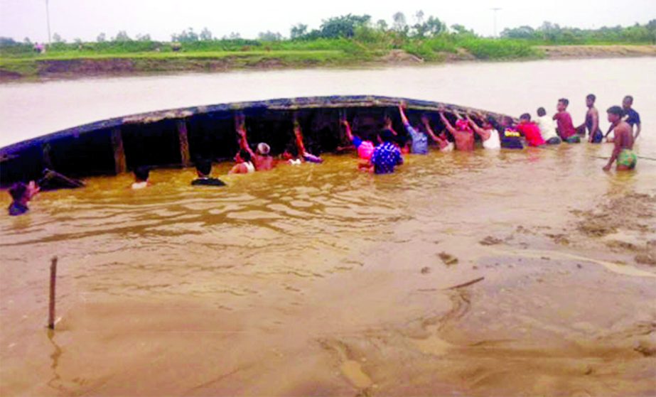 At least five people were killed and seven missing as a boat capsized in Khowai River in Lambabagh area of Habiganj on Friday.