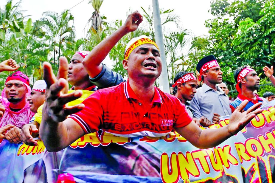 Rohingyas living in Malaysia protest against the treatment of Myanmar's Rohingya Muslims near the Myanmar embassy in Kuala Lumpur on Friday.